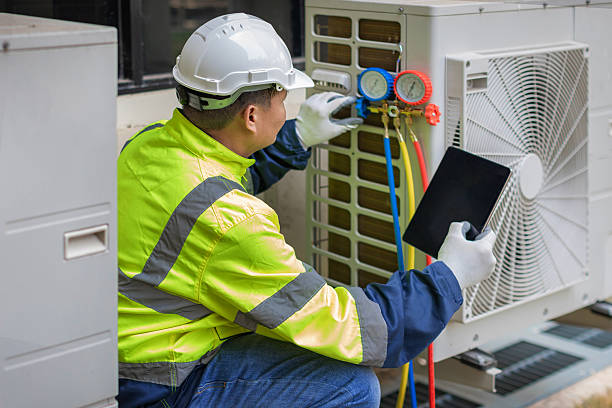 Professional Heat Pump Repair technician working in Holladay, UT